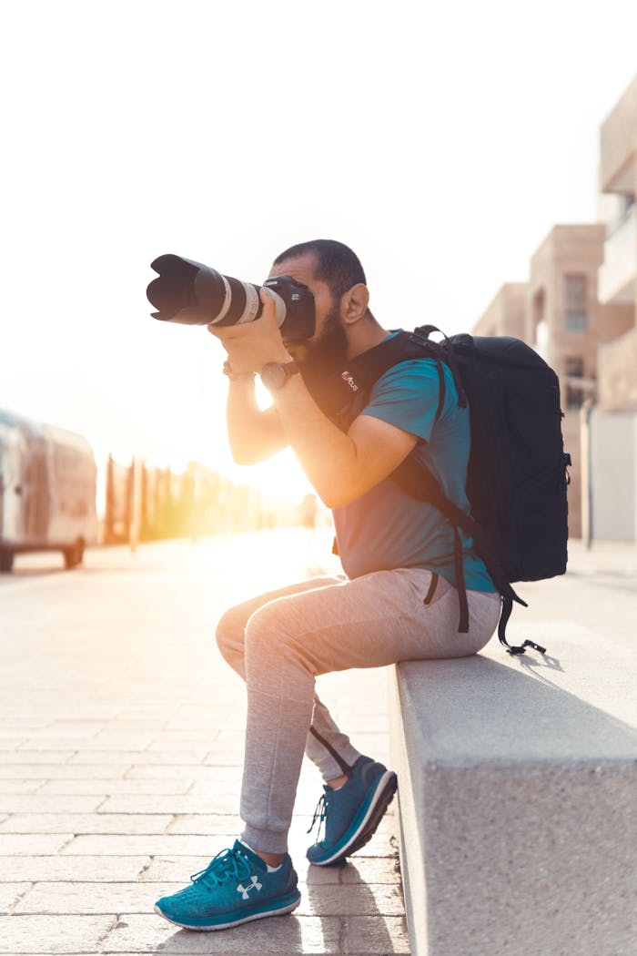 A photographer takes street shots in Rabat, Morocco during the day.
